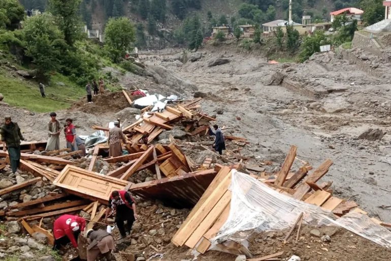 NURISTAN, AFGHANISTAN - JULY 20: At least 20 people were killed and more than 100 remained missing after severe flash floods struck Afghanistan's eastern Nuristan province on Monday. Afghanistan's National Disaster Management Authority (ANDMA) said more than 80 people were also injured in Parun, the provincial capital, according to the state-run Bakhtar News Agency. ANDMA spokesperson Yusuf Hammad said search-and-rescue operations are ongoing, with emergency teams deployed to the affected area. He warned that the death toll is expected to rise as rescue efforts continue. مدينة بارون، مركز ولاية نورستان في أفغانستان