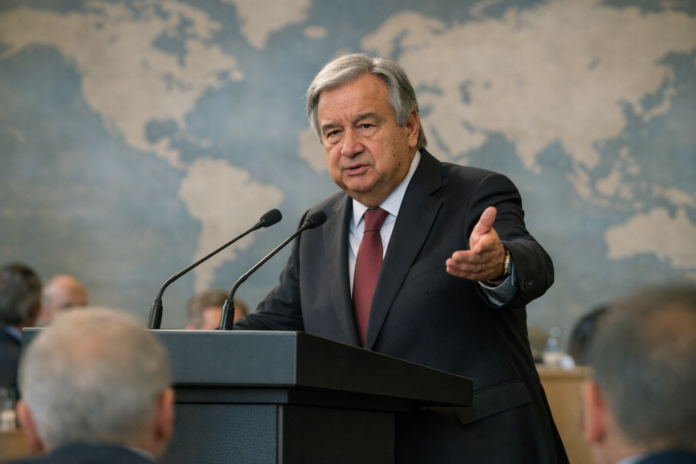 UN Secretary-General António Guterres speaks at a podium